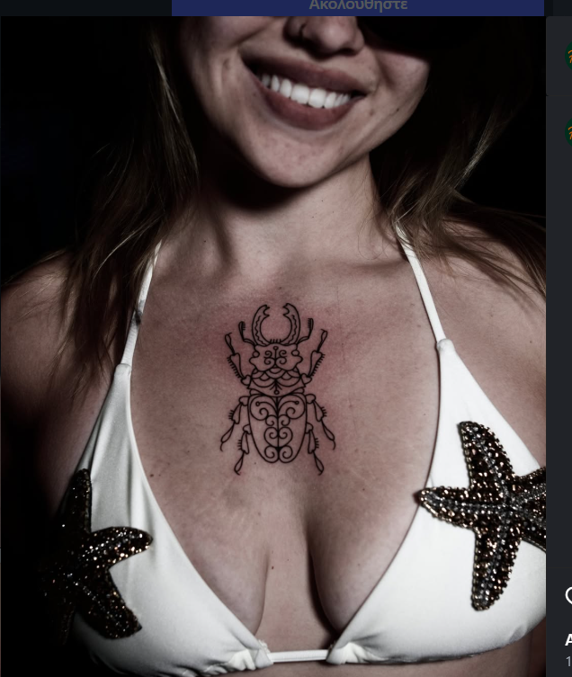 Fine line beetle tattoo on sternum