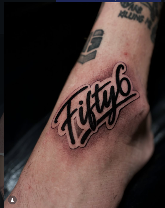 Fifty6 script lettering tattoo on foot